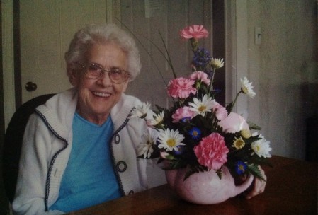 Some flowers I had sent her.  Aunt Koula took a picture of her with them.  