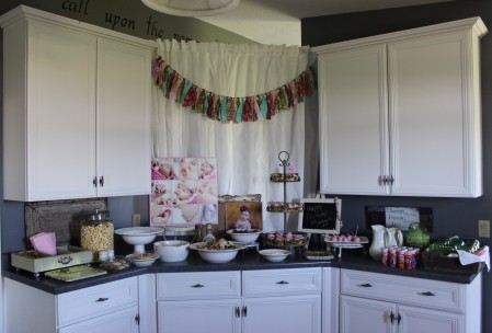 The spread.  Instead of a cake I had cupcakes in the tower.  Green mason jars for the mommies drinks.  Chevron pink straws.